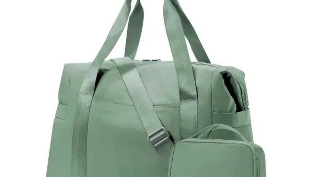 Set of packing cubes in multiple sizes packed inside an open suitcase